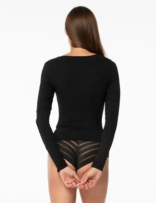 Blusa da donna liscia ed elastica con maniche lunghe