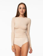 Blusa da donna liscia ed elastica con maniche lunghe