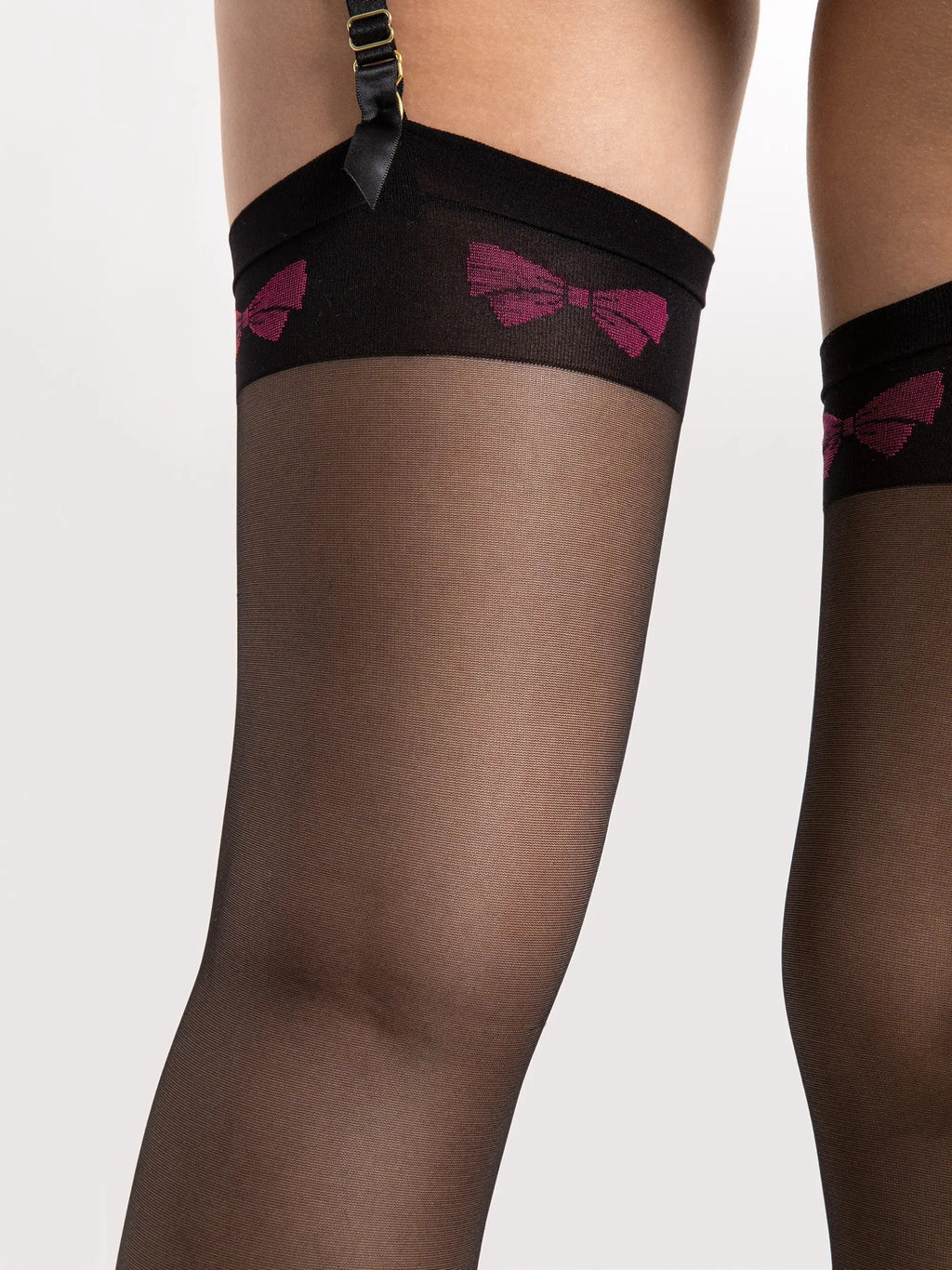 Calze velate per reggicalze con fantasia a fiocchetti rossi