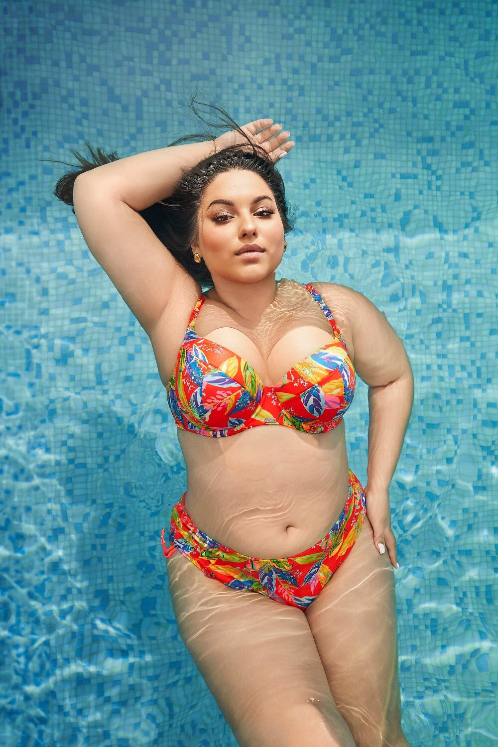 Slip bikini con regolazione laterale vivid orange