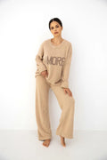 Zerina - tuta homewear da donna in soffice bouclé