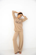 Zerina - tuta homewear da donna in soffice bouclé