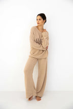 Zerina - tuta homewear da donna in soffice bouclé