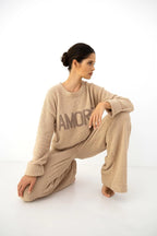 Zerina - tuta homewear da donna in soffice bouclé